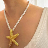 Collar de estrella de Mar dorado