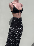 Falda lunares blancos con zipper atrás