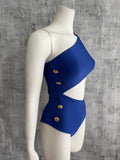 Gold buttons cut out blue one piece